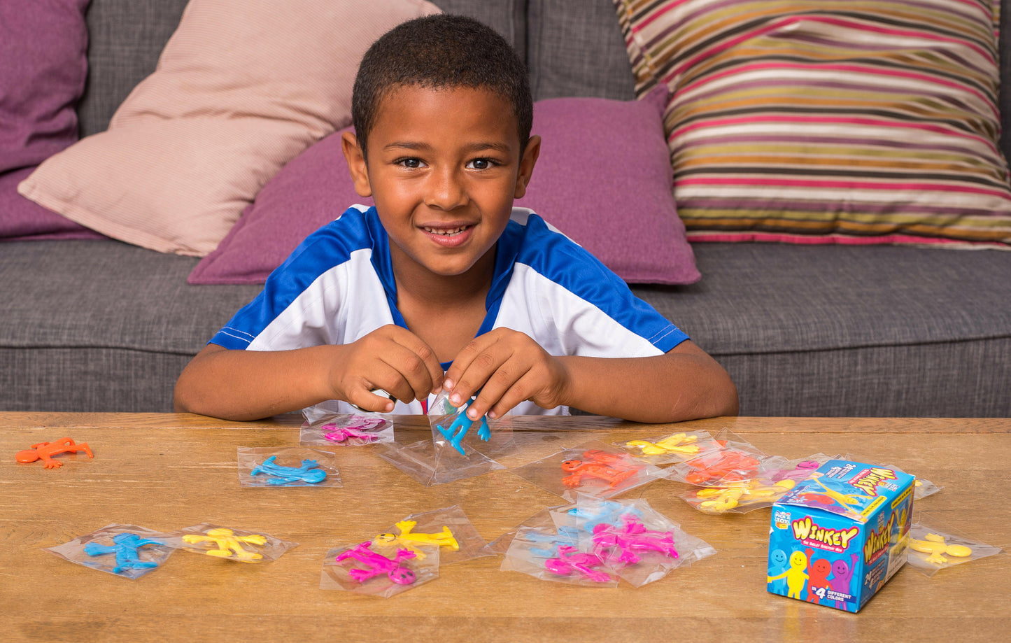 Stretchy Smiley Man 24 Set With 4 Different Colors - Pick A Toy