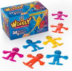 Seven smiley stretchy man party favors in four bright colors arranged in front of their blue gift box