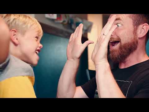 Video for the mini flying unicorn finger slingshot toys, opening on a boy and a man high-fiving