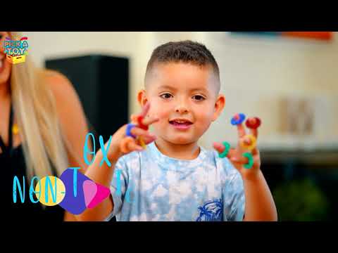 Video of a smiling boy wearing colorful finger rings from the fidget sensory toys set